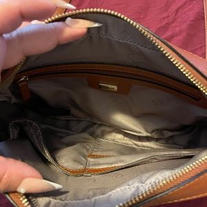Lightly used brown Guess crossbody bag with duster